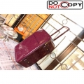 Louis Vuttion Burgundy patent leather wheeled luggage